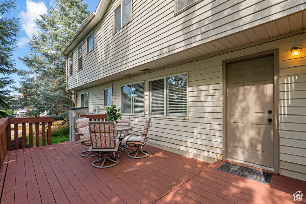 Wooden deck with outdoor dining space