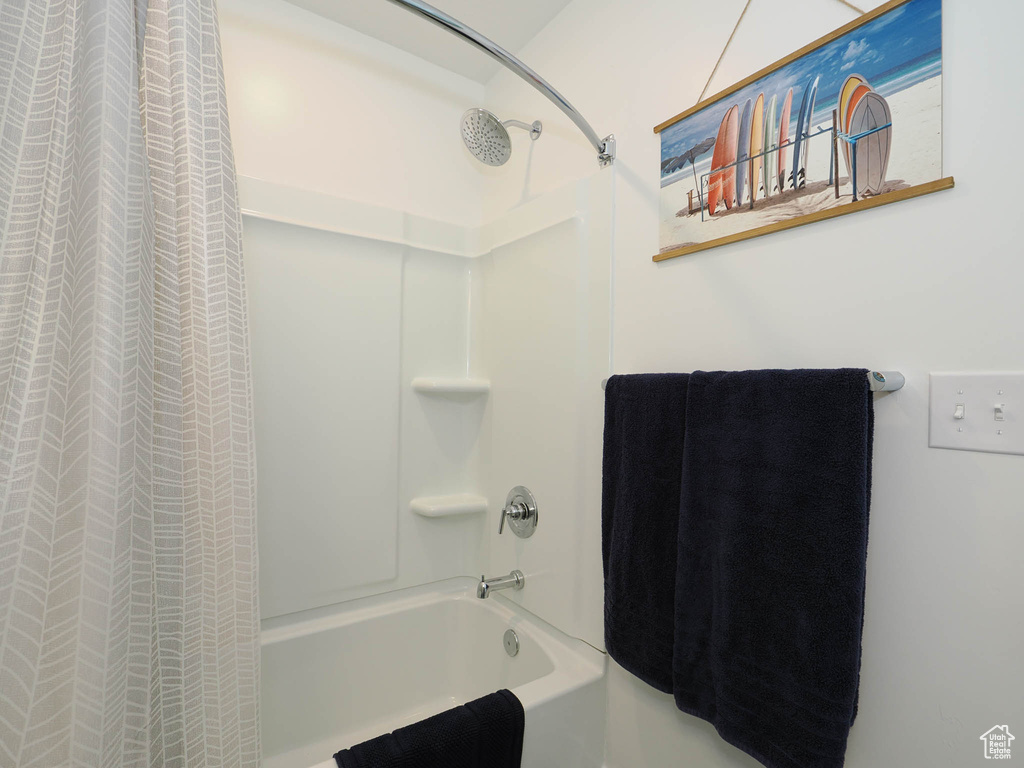 Full bath featuring shower / tub combo