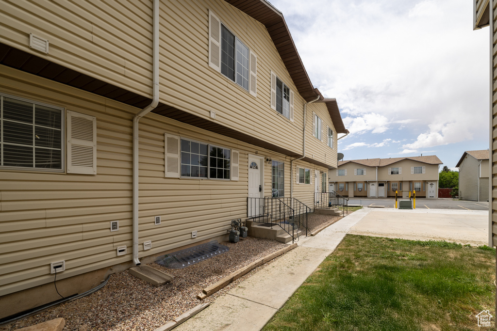Rear view of property with a residential view