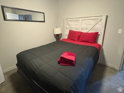 Bedroom with carpet flooring