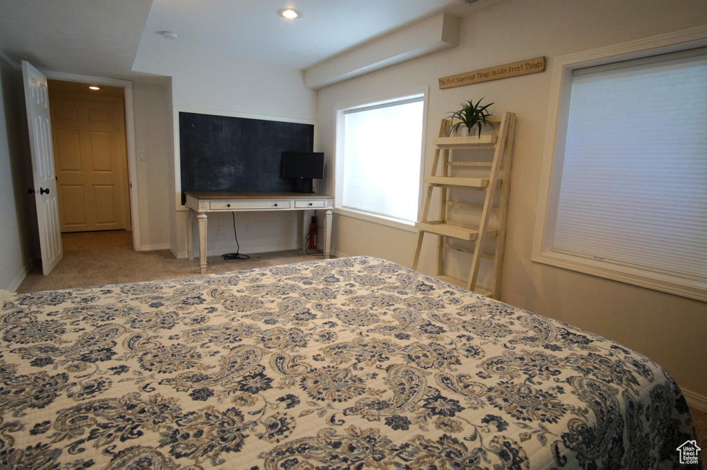 Bedroom featuring baseboards, carpet, and recessed lighting