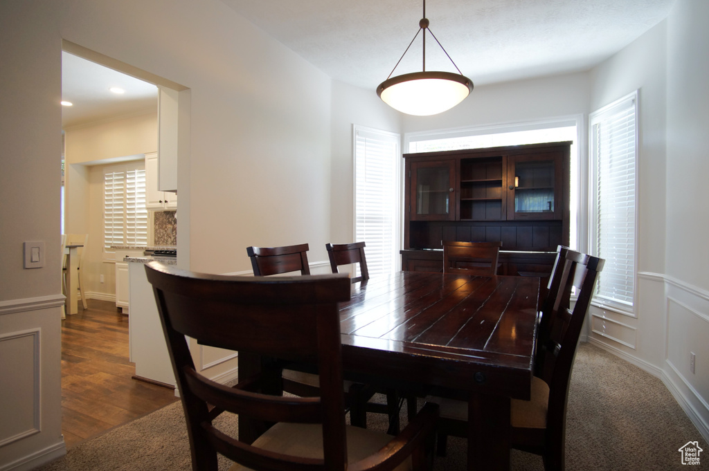 Dining space featuring recessed lighting