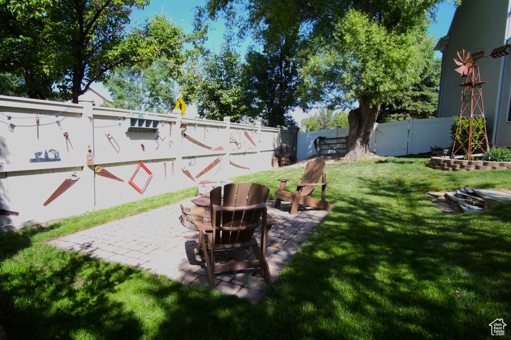 View of yard with a patio