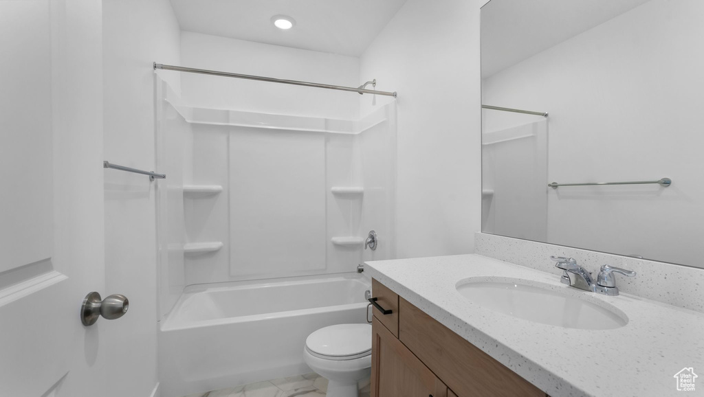 Bathroom featuring vanity and bathtub / shower combination
