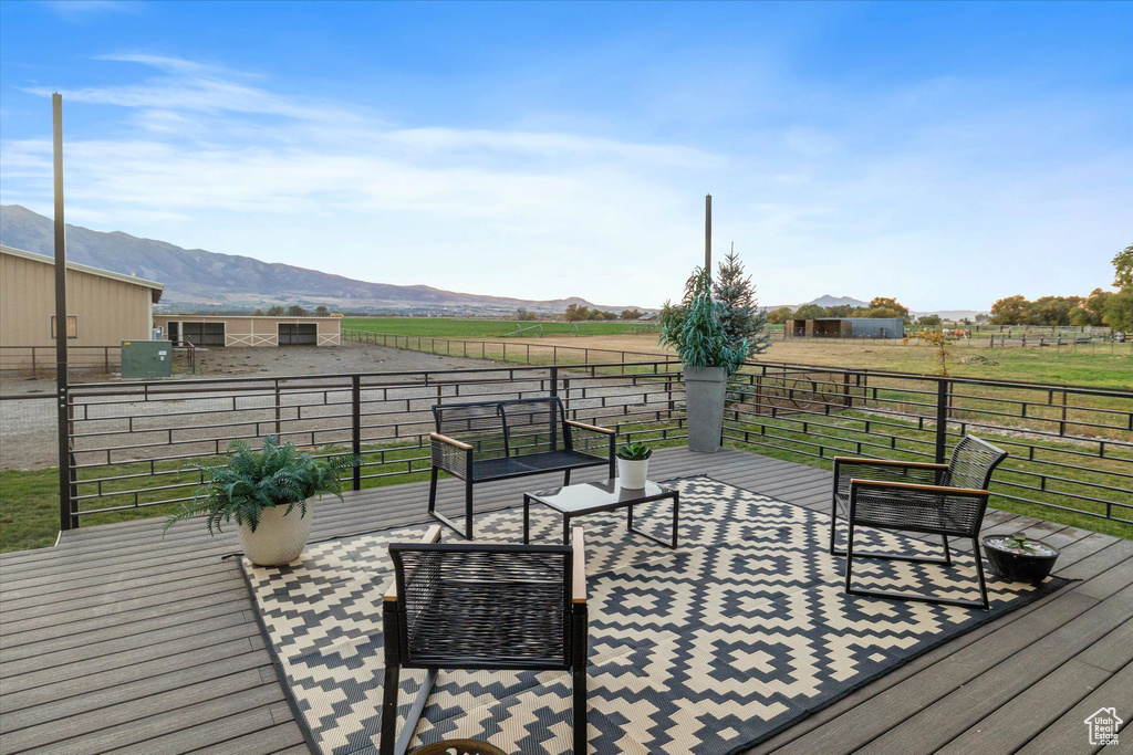 Wooden terrace with a mountain view and a rural view