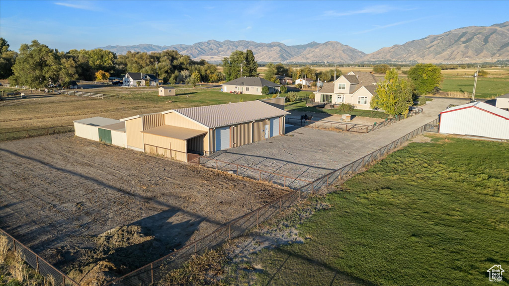 Aerial view of residential area featuring a mountain backdrop