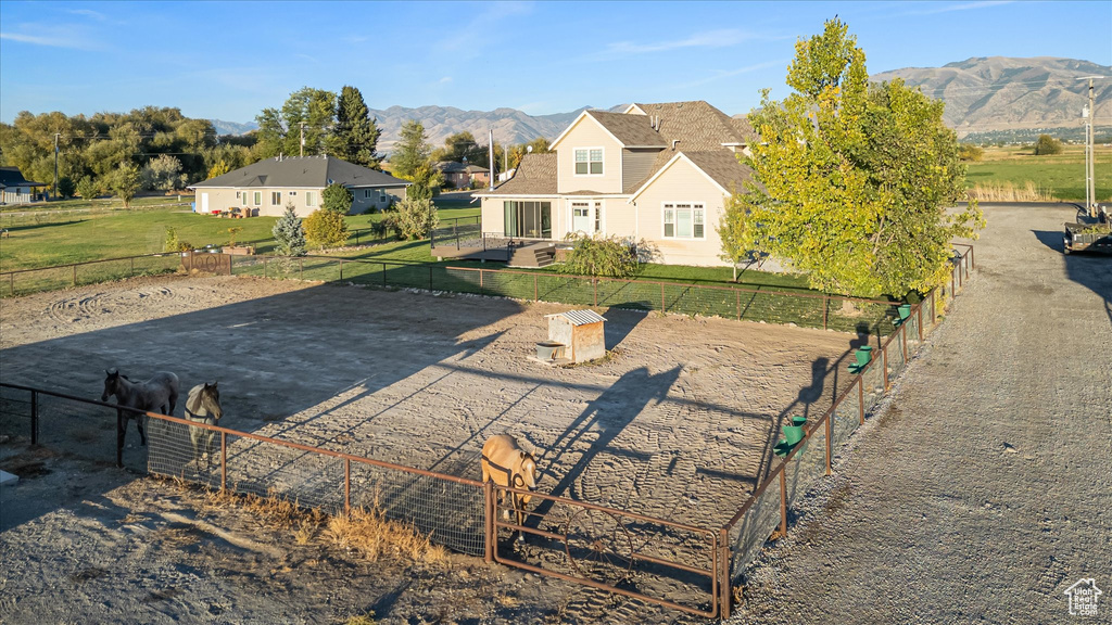 View of front of house featuring a mountain view