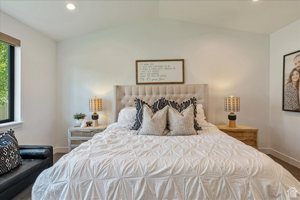 Bedroom with baseboards, vaulted ceiling, carpet, and recessed lighting