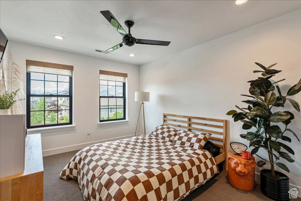 Bedroom featuring carpet, recessed lighting, baseboards, and ceiling fan