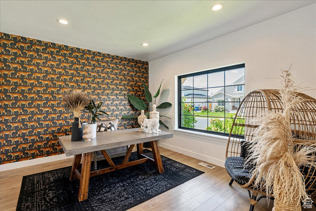 Office area with recessed lighting, baseboards, and wood finished floors