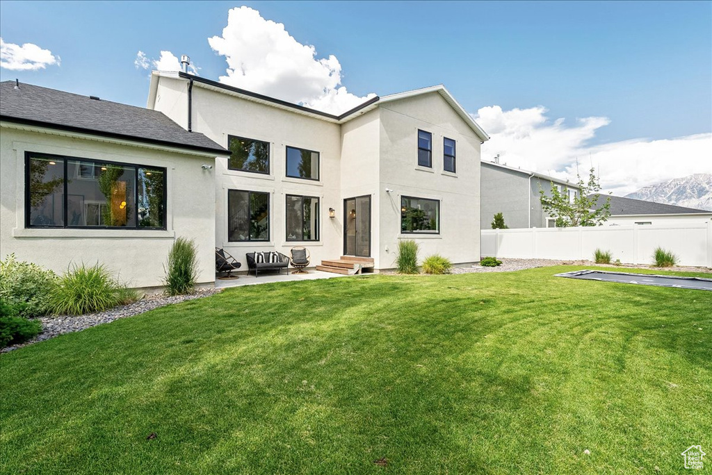 View of front of house featuring stucco siding