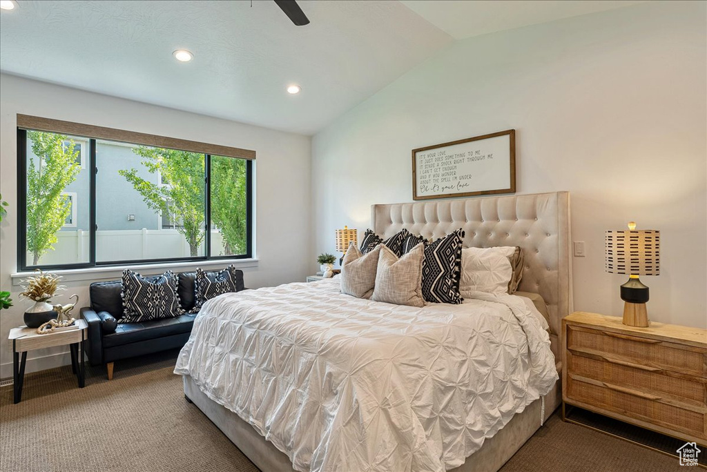 Bedroom with vaulted ceiling, recessed lighting, carpet floors, and a ceiling fan