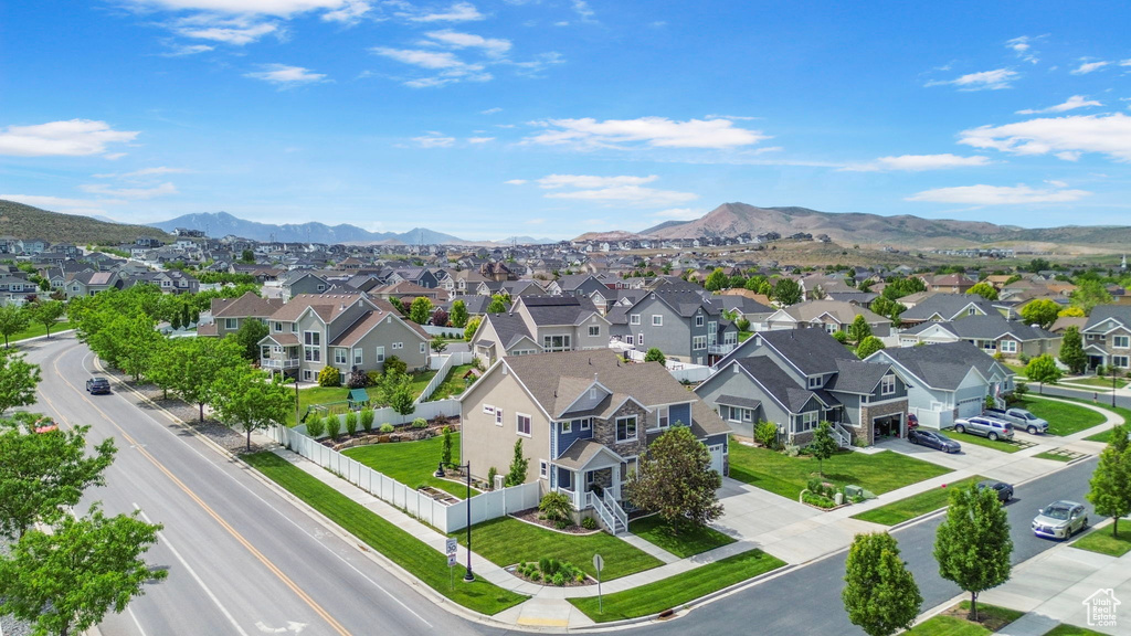 Aerial view of residential area with mountains