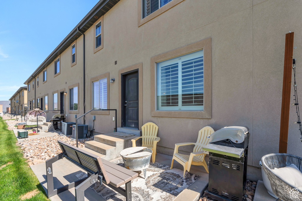 View of patio / terrace featuring cooling unit
