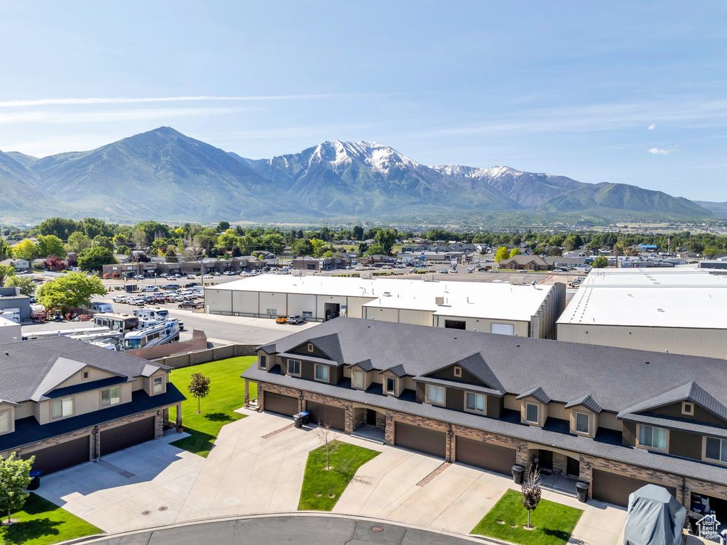 View of mountain backdrop featuring nearby suburban area