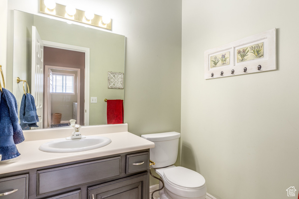 Bathroom with toilet and vanity