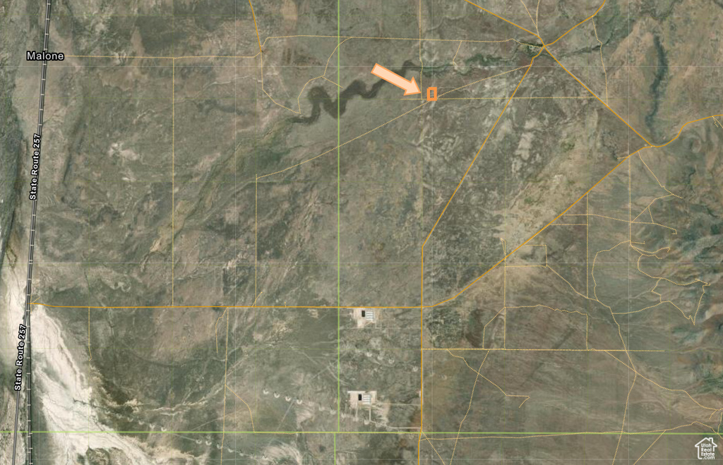 Aerial map of property and surrounding area with property boundaries highlighted