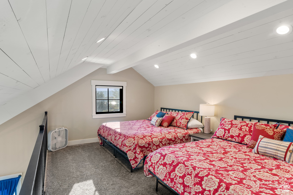 Carpeted bedroom with recessed lighting, baseboards, and wood ceiling