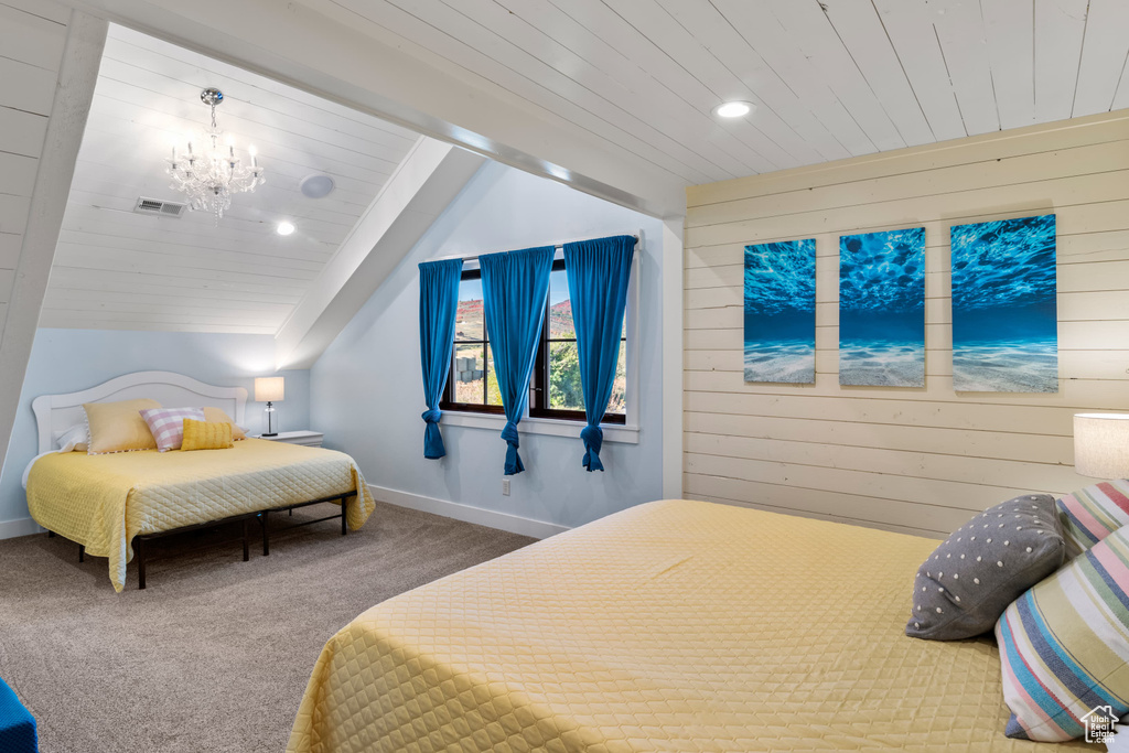 Carpeted bedroom featuring lofted ceiling, a chandelier, wooden ceiling, wood walls, and recessed lighting