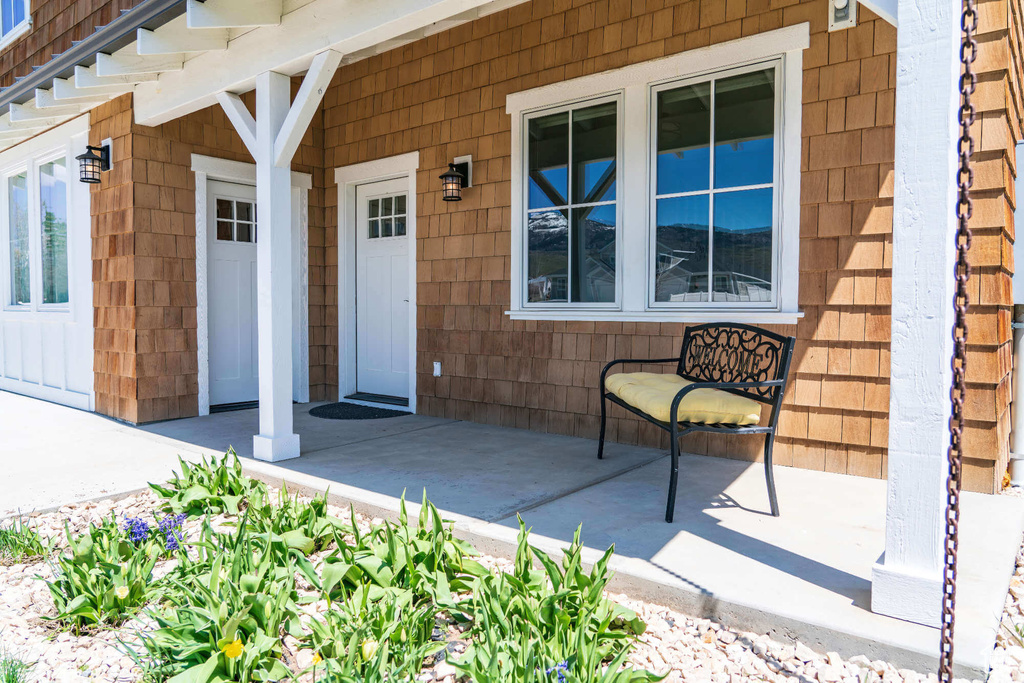 Entrance to property with covered porch