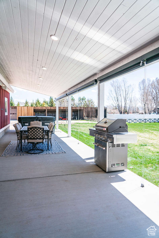View of patio / terrace featuring area for grilling and outdoor dining area