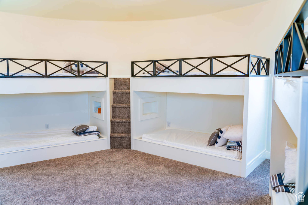 Unfurnished bedroom featuring carpet flooring