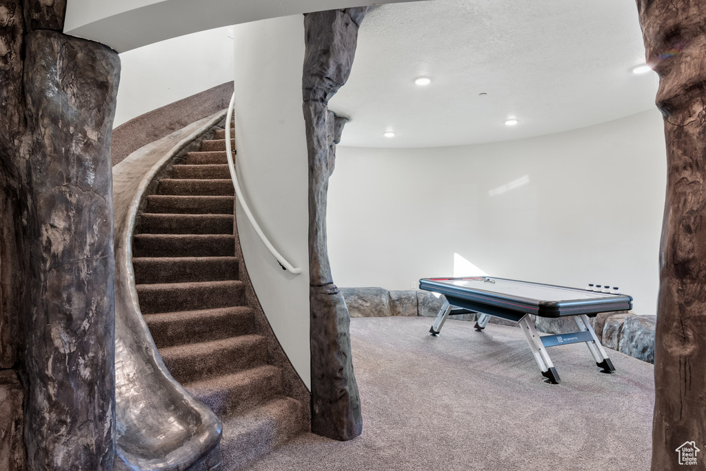 Game room featuring carpet and recessed lighting