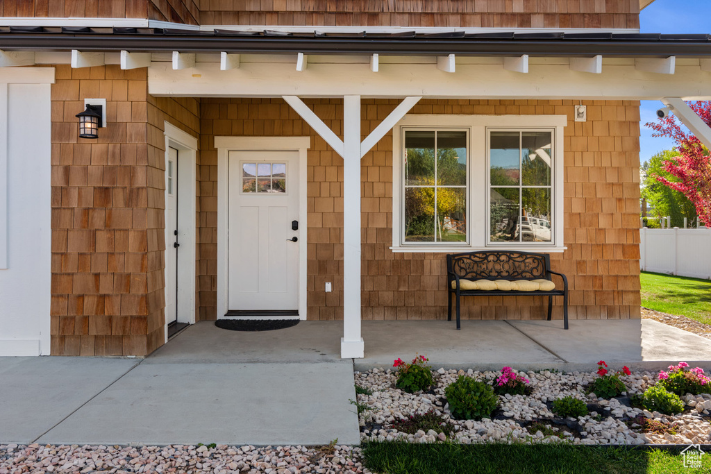 Entrance to property with covered porch