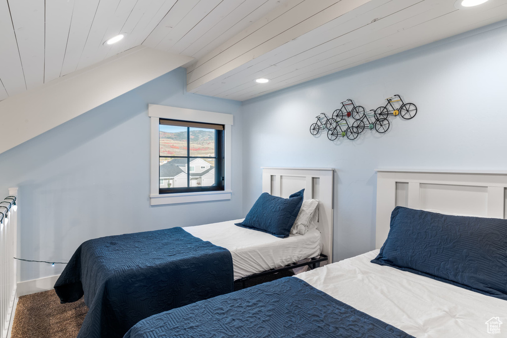 Bedroom with recessed lighting, carpet, and wooden ceiling