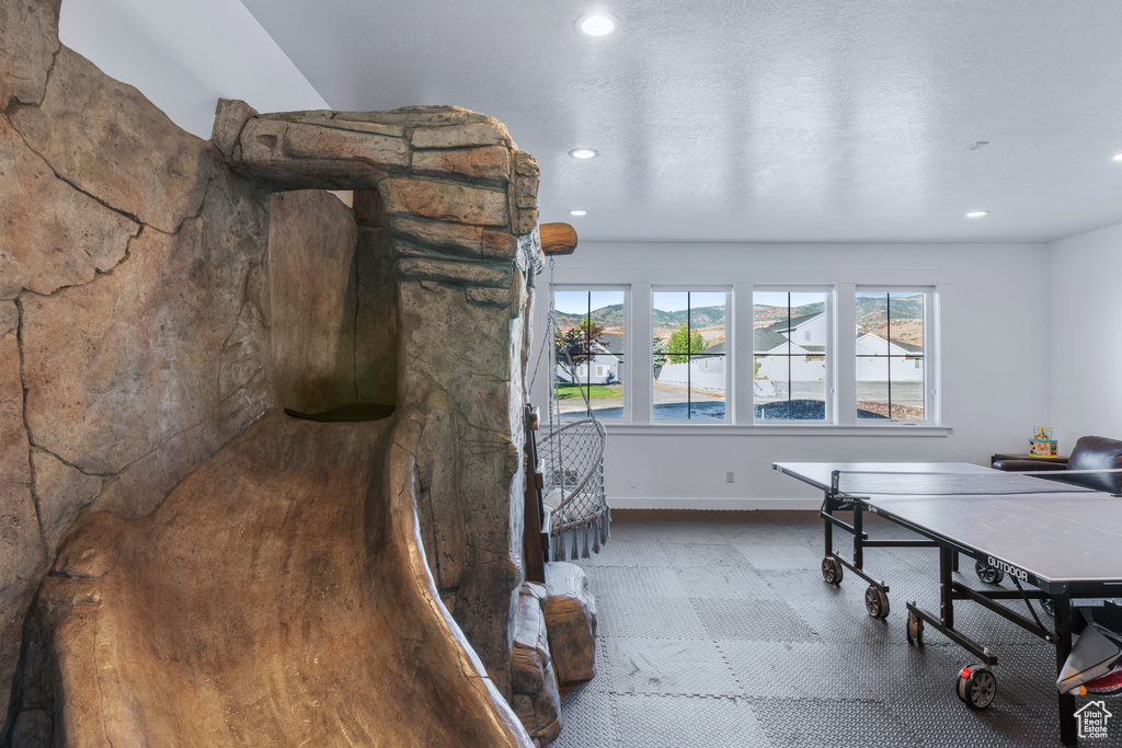 Dining area with recessed lighting and baseboards