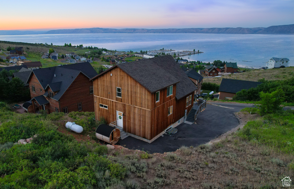 View from above of property featuring a water and mountain view