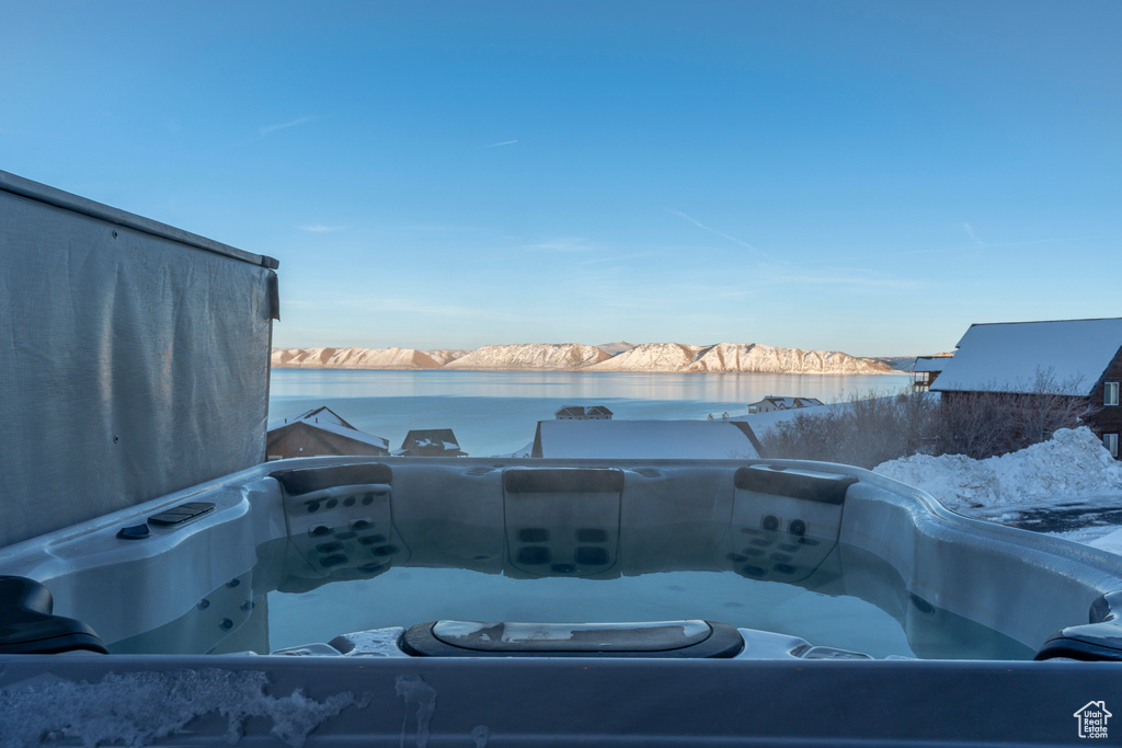 View of patio / terrace with a water view