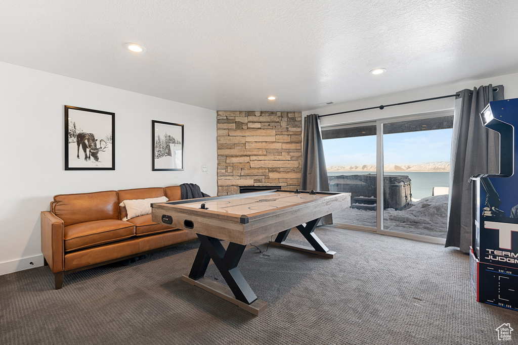 Game room featuring carpet floors, recessed lighting, and baseboards