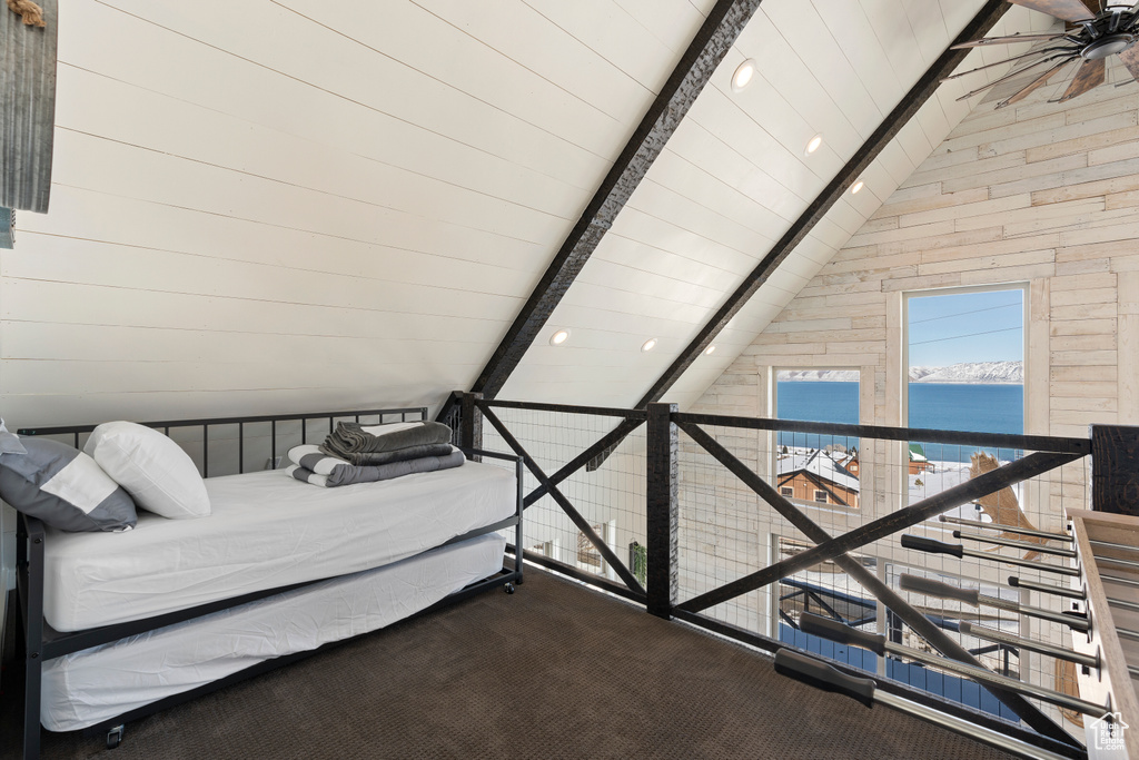 Bedroom featuring a water view, carpet, and recessed lighting