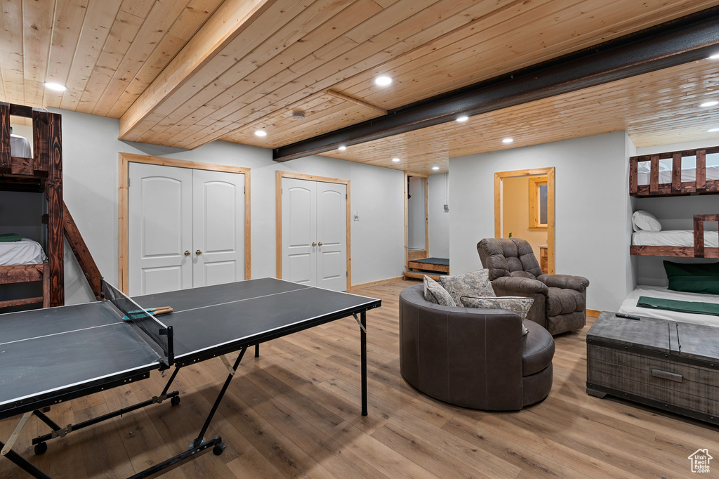 Rec room featuring recessed lighting, wooden ceiling, and light wood-type flooring
