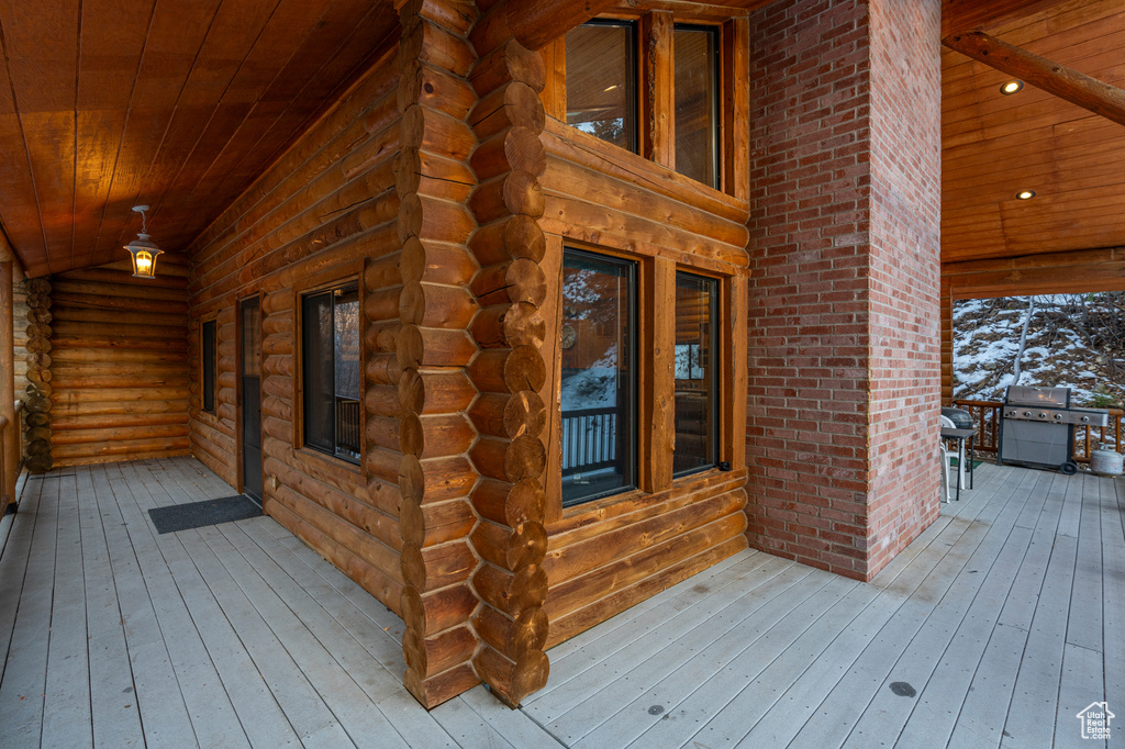Porch featuring area for grilling