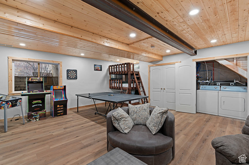Playroom with washer and clothes dryer, hardwood / wood-style floors, wood ceiling, recessed lighting, and baseboards
