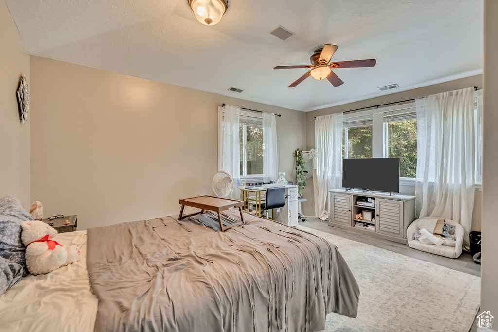 Bedroom featuring wood finished floors