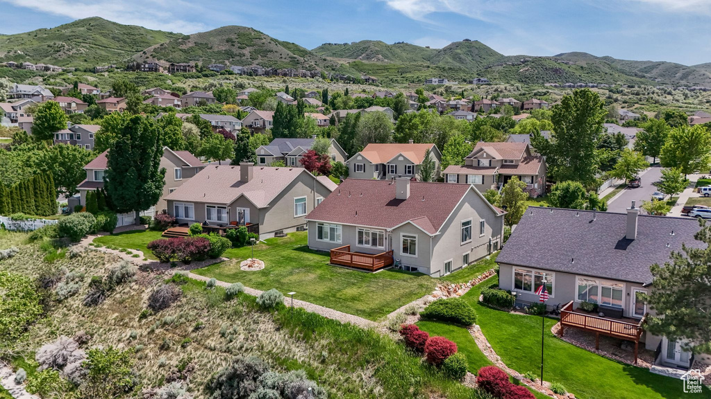 Aerial perspective of suburban area with mountains