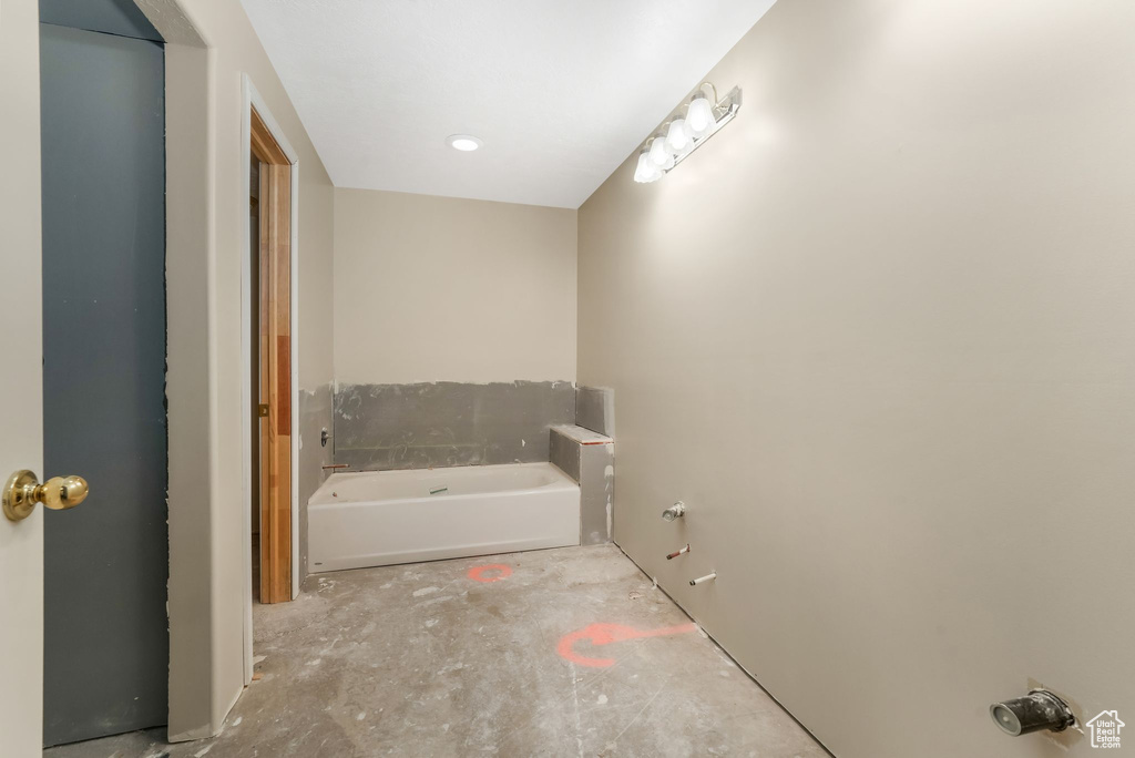 Full bath featuring a garden tub