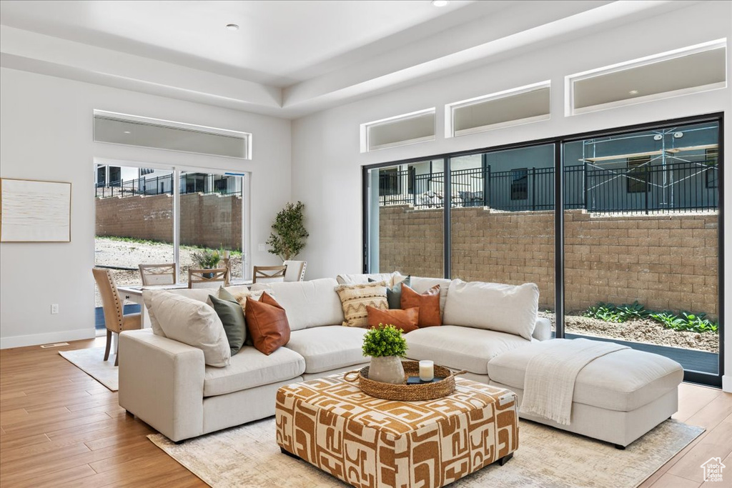 Living area featuring wood finished floors and baseboards