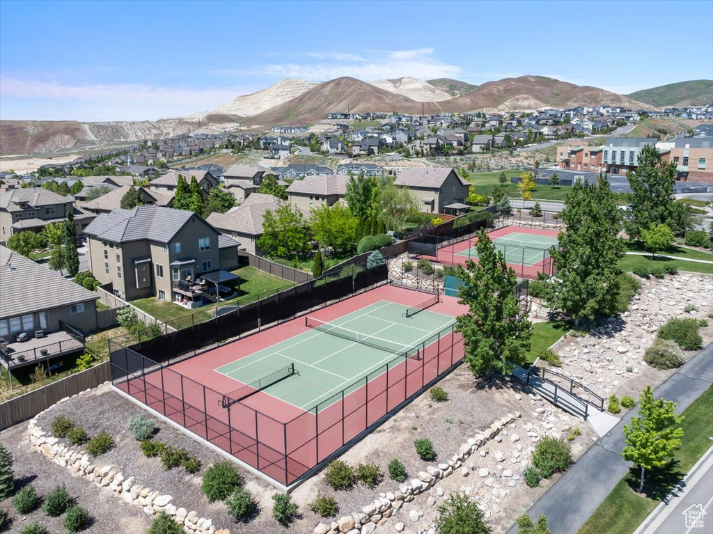 Aerial perspective of suburban area featuring mountains