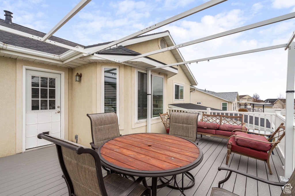 Wooden terrace with outdoor dining area