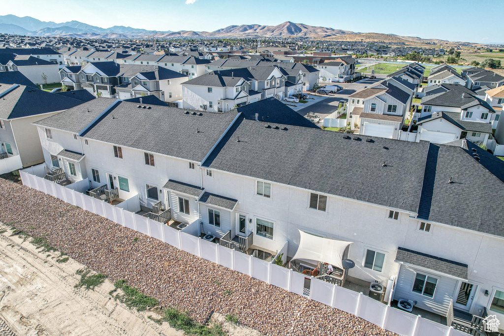 Aerial perspective of suburban area featuring mountains
