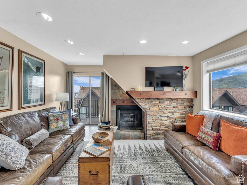 Living area featuring a fireplace and recessed lighting