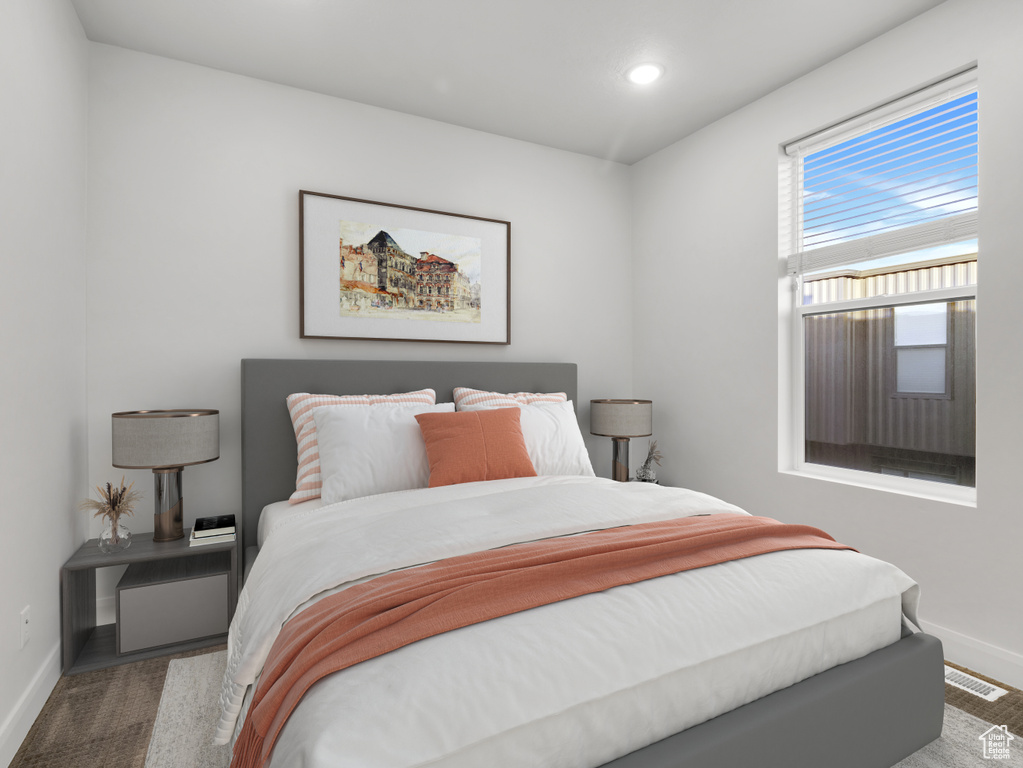 Bedroom with baseboards and recessed lighting