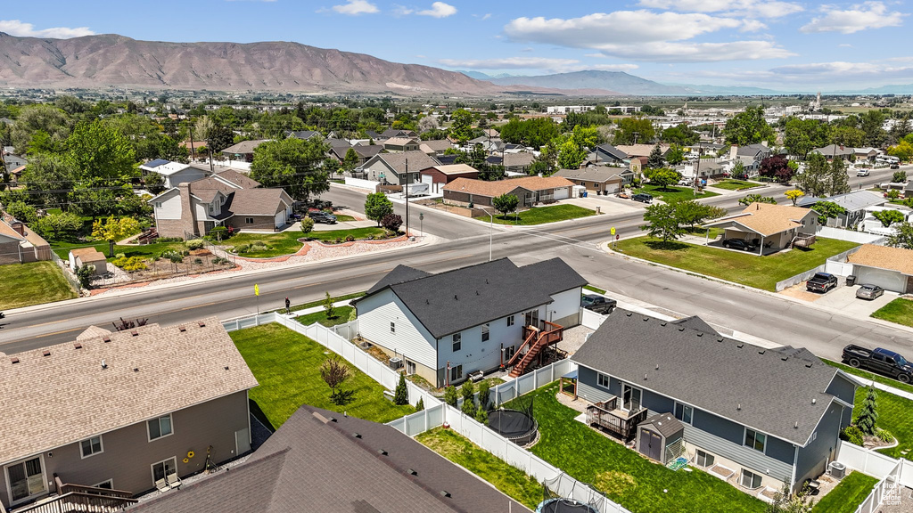 Aerial view of residential area with mountains