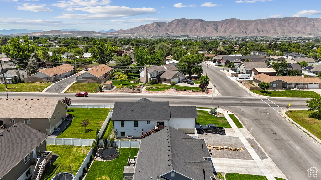Aerial view of residential area with a mountain backdrop