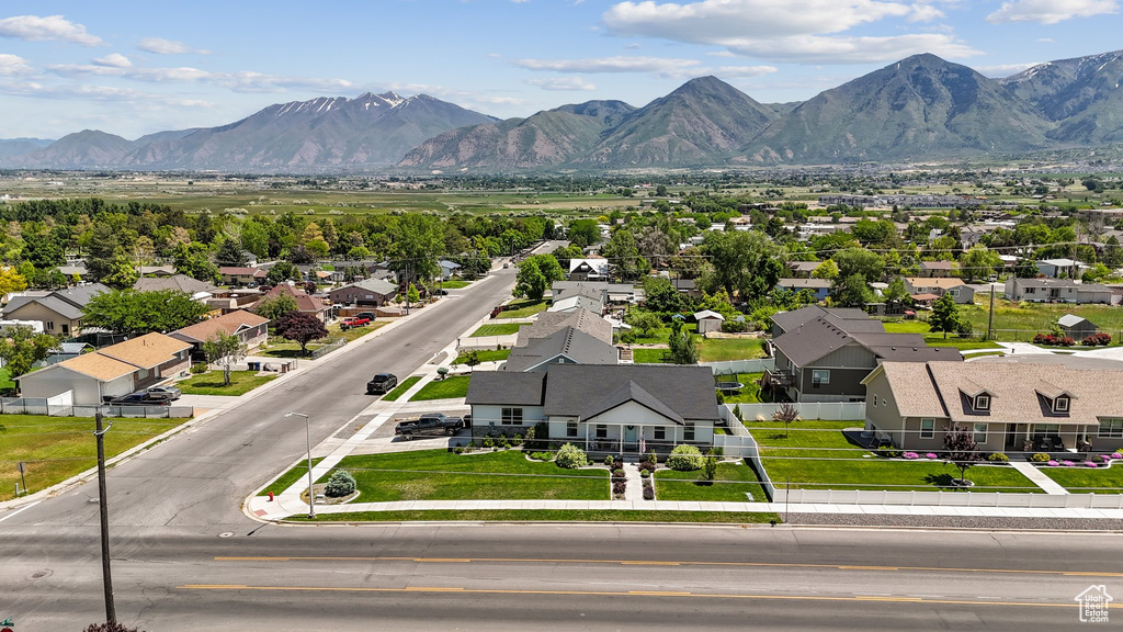 View of mountain background featuring nearby suburban area