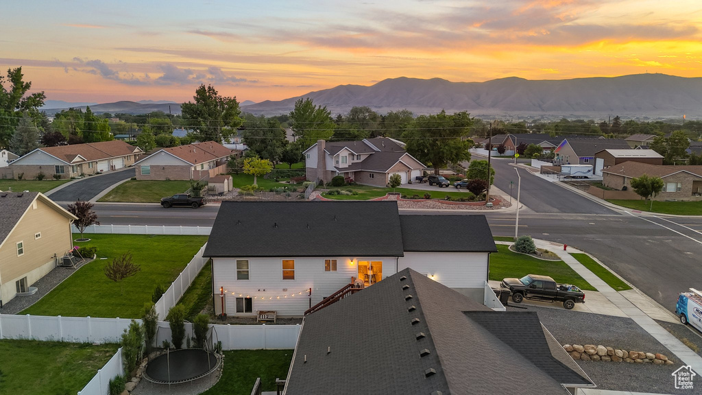 Aerial view at dusk of a mountain view and a residential view